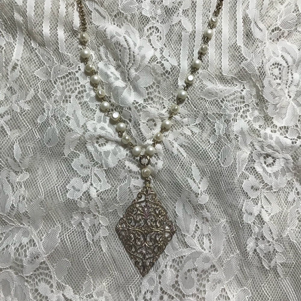 Pearl and gold necklace